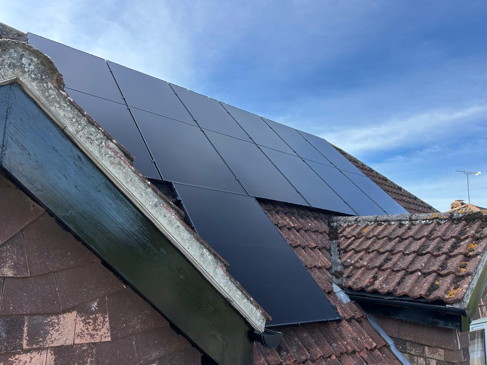 Solar PV panels installed on a gable end roof in Hampshire